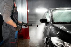 Car being washed with foam at a car wash